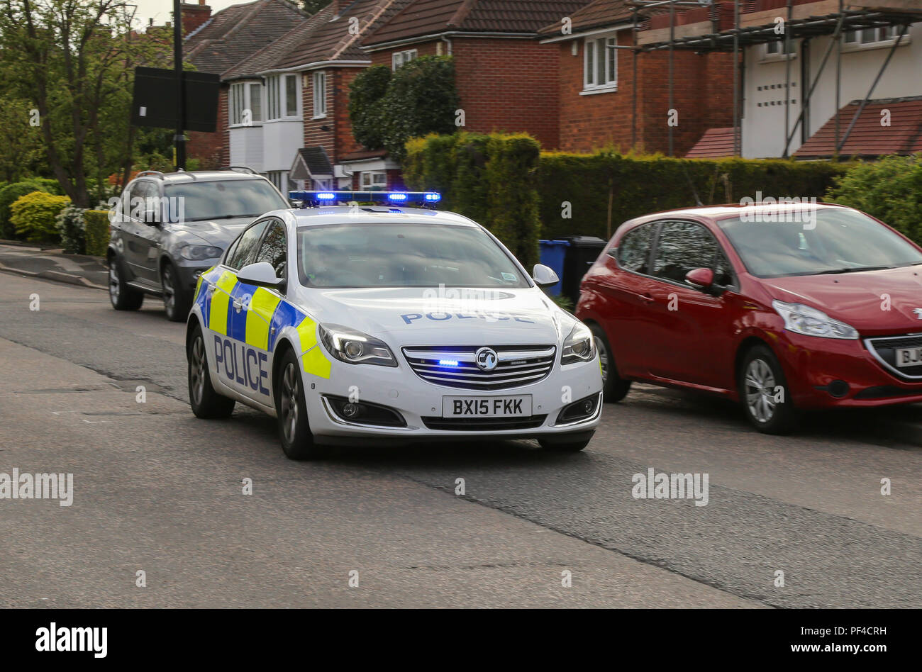 Une intervention d'urgence de la Police de West Midlands, voiture vu en route pour un incident dans la région de Birmingham, du Royaume-Uni. Banque D'Images