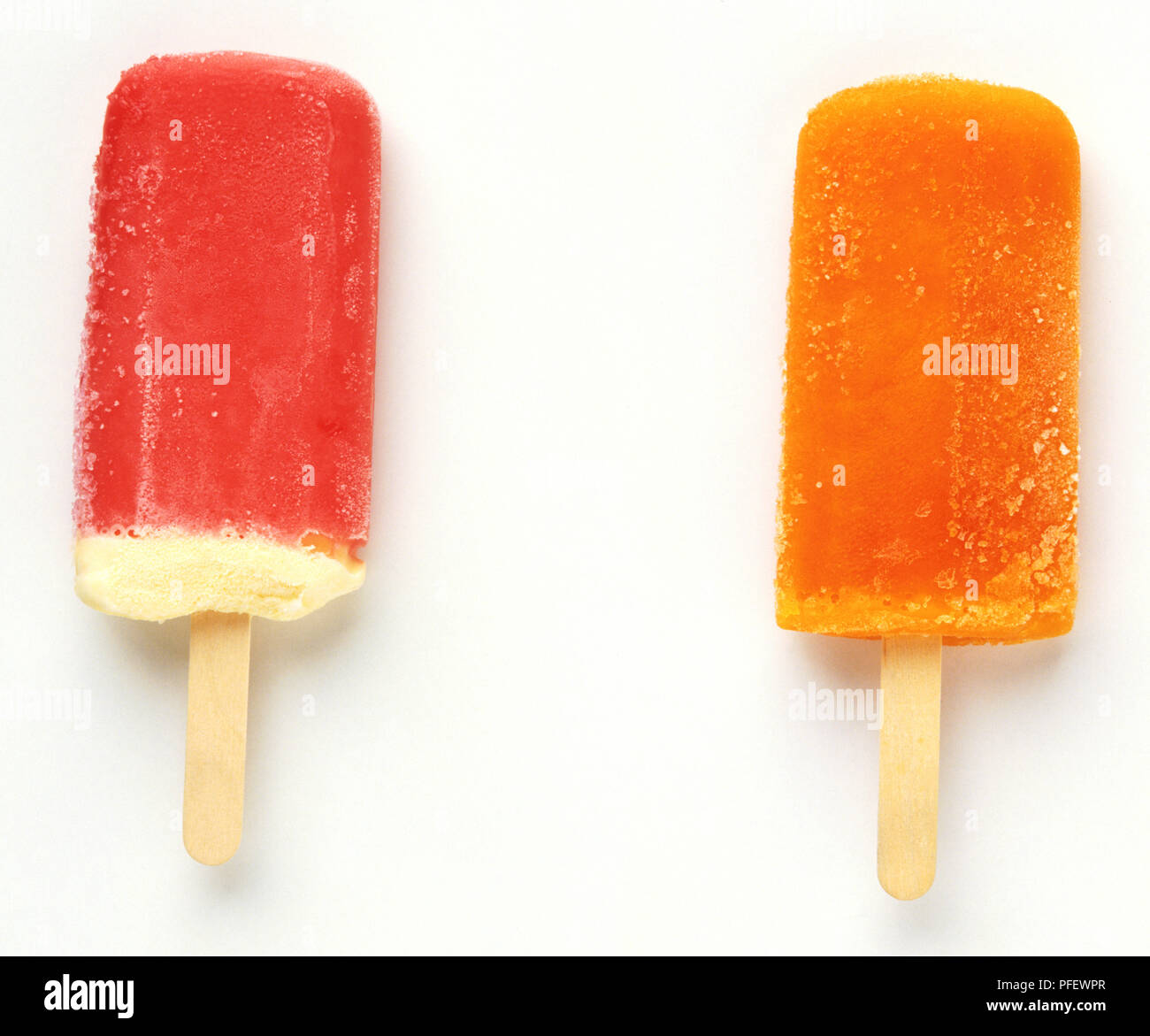 Rose et orange ice lollies Banque D'Images