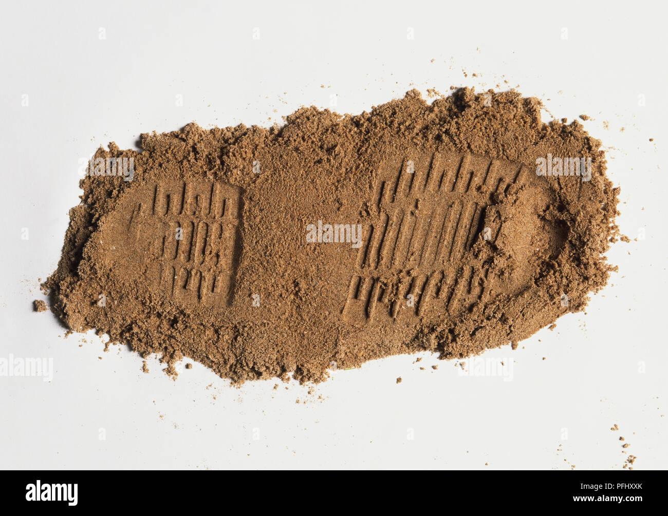 Shoe-print sur les petits tas de sable, Close up. Banque D'Images