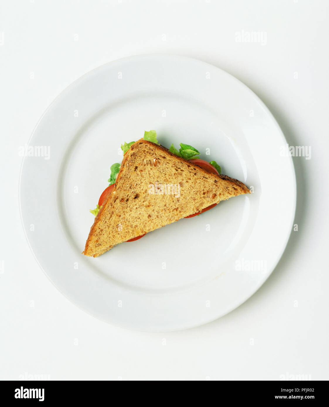 La moitié d'un sandwich sur une plaque Banque D'Images