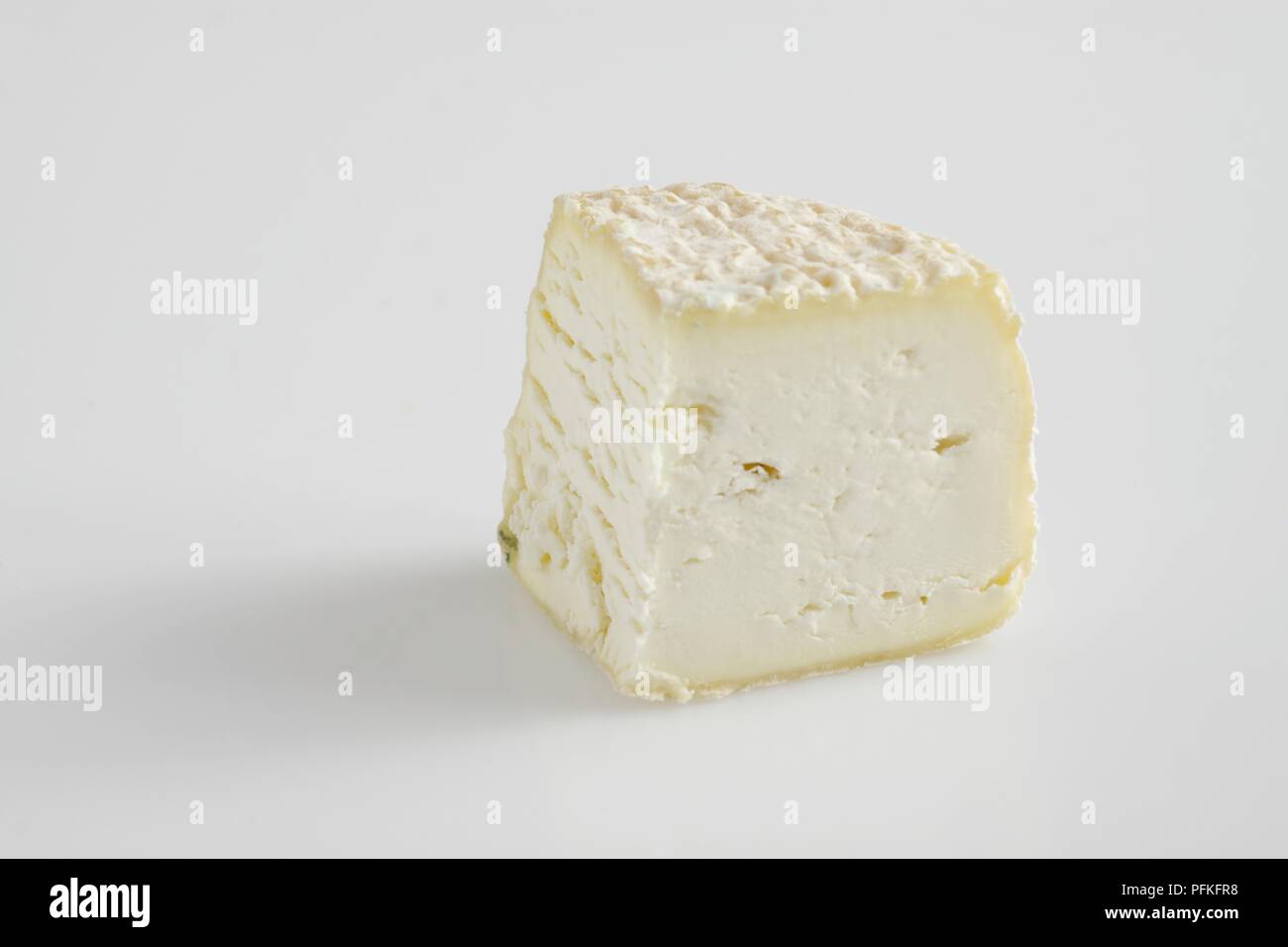 Tranche de fromage de chèvre Berrichon Français Banque D'Images