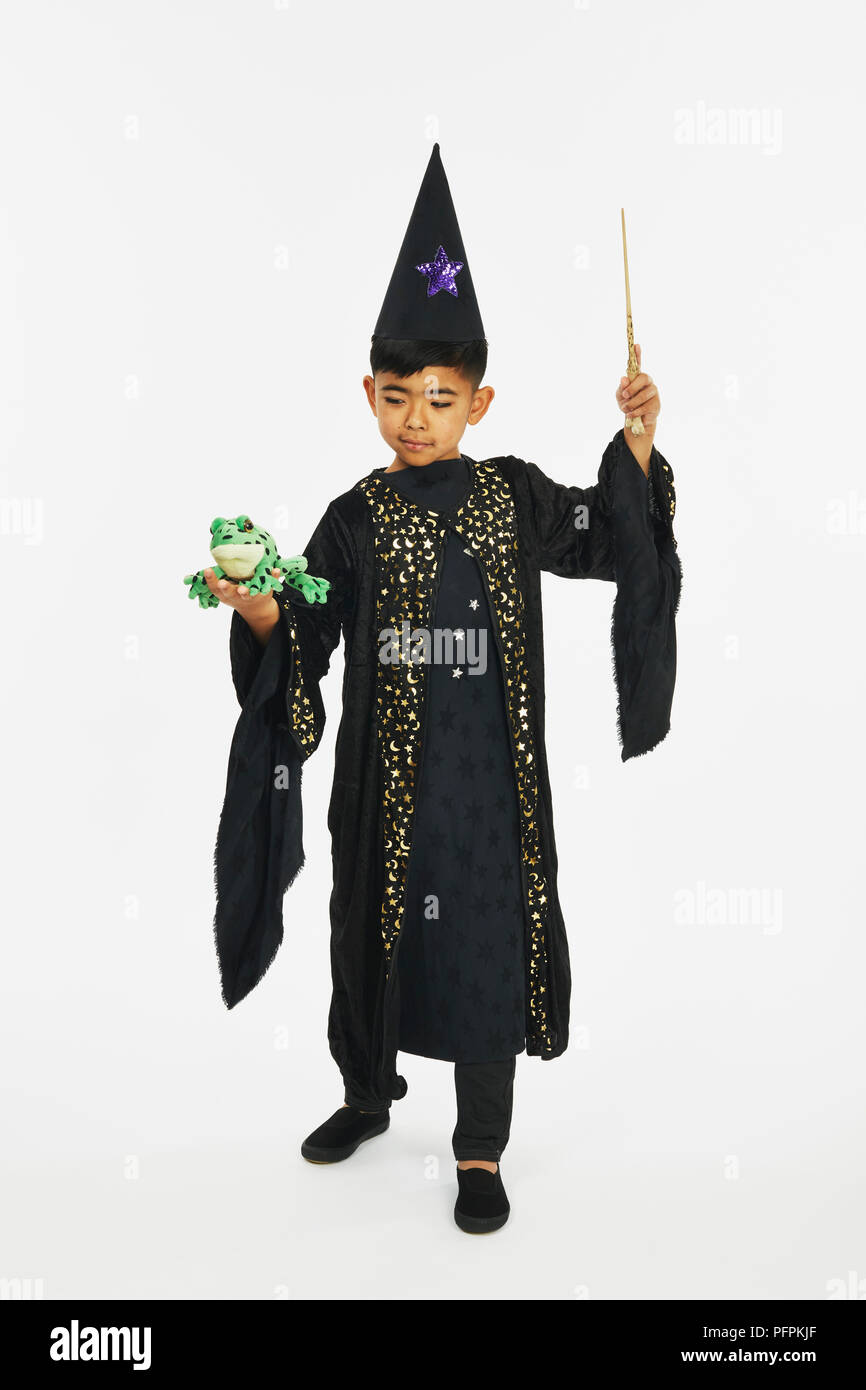 Avec l'assistant d'une baguette magique et un crapaud Banque D'Images