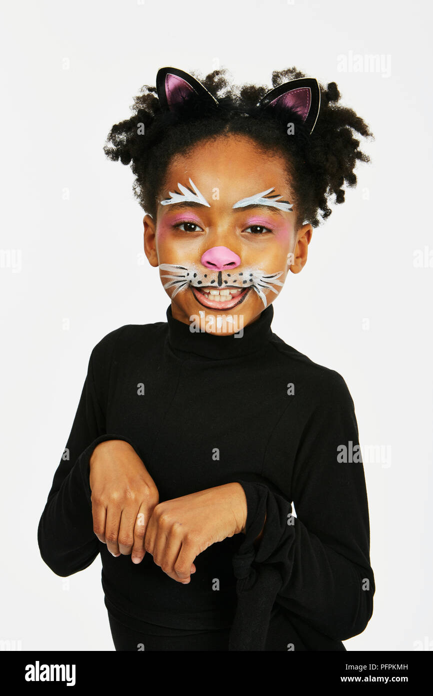Enfant habillé en black cat Banque D'Images