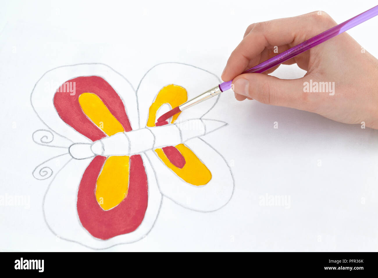 Coloriage de contours de papillon sur le papier transfert Banque D'Images