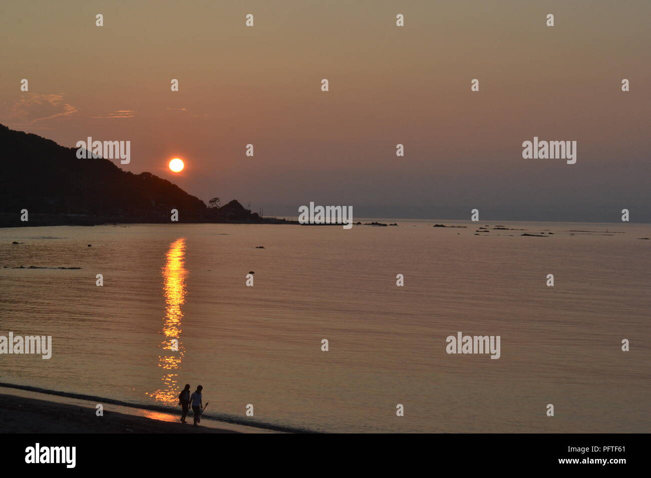 Coucher de soleil à la plage Banque D'Images