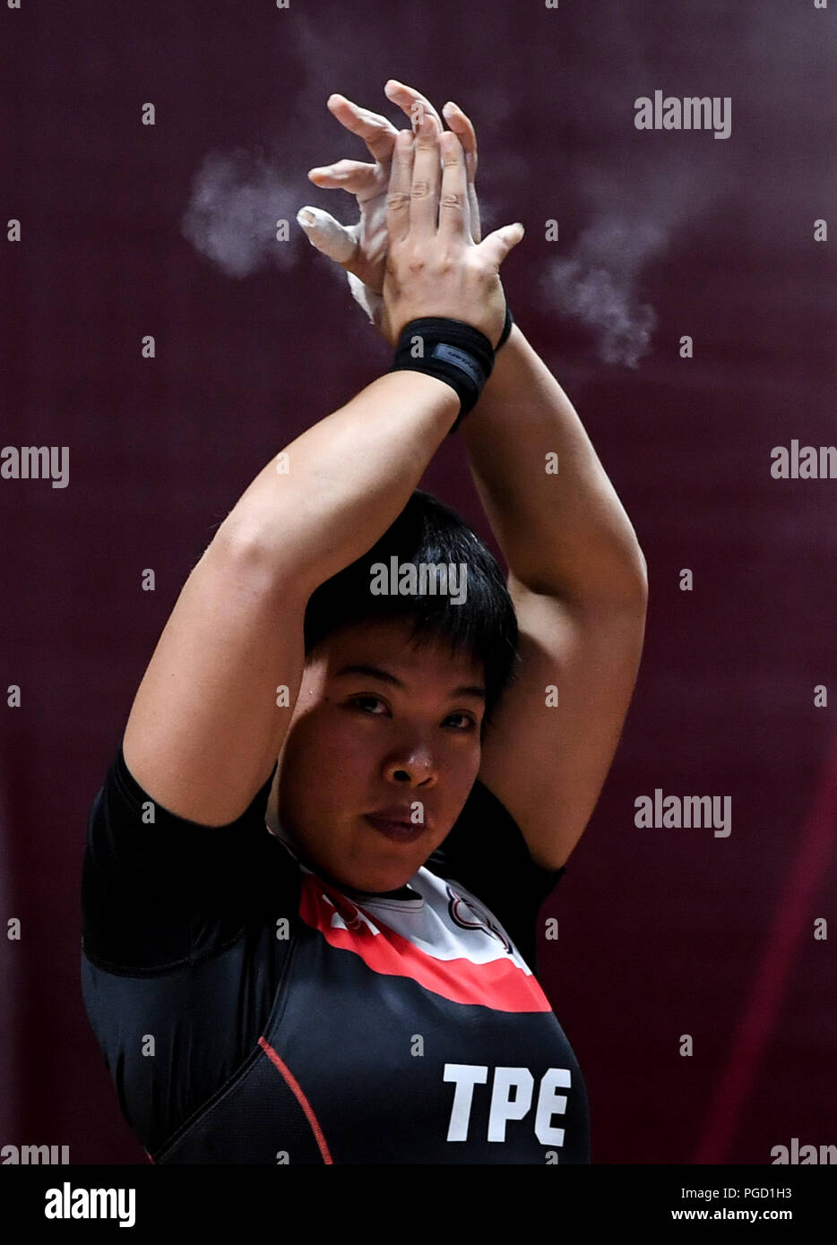 (180825) -- JAKARTA, 25 août 2018 (Xinhua) -- Hung qui veulent du Taipei chinois réagit après l'haltérophilie 69kg lors de la 18e Jeux asiatiques à Jakarta, Indonésie, le 25 août 2018. (Xinhua/Du Yu) Banque D'Images