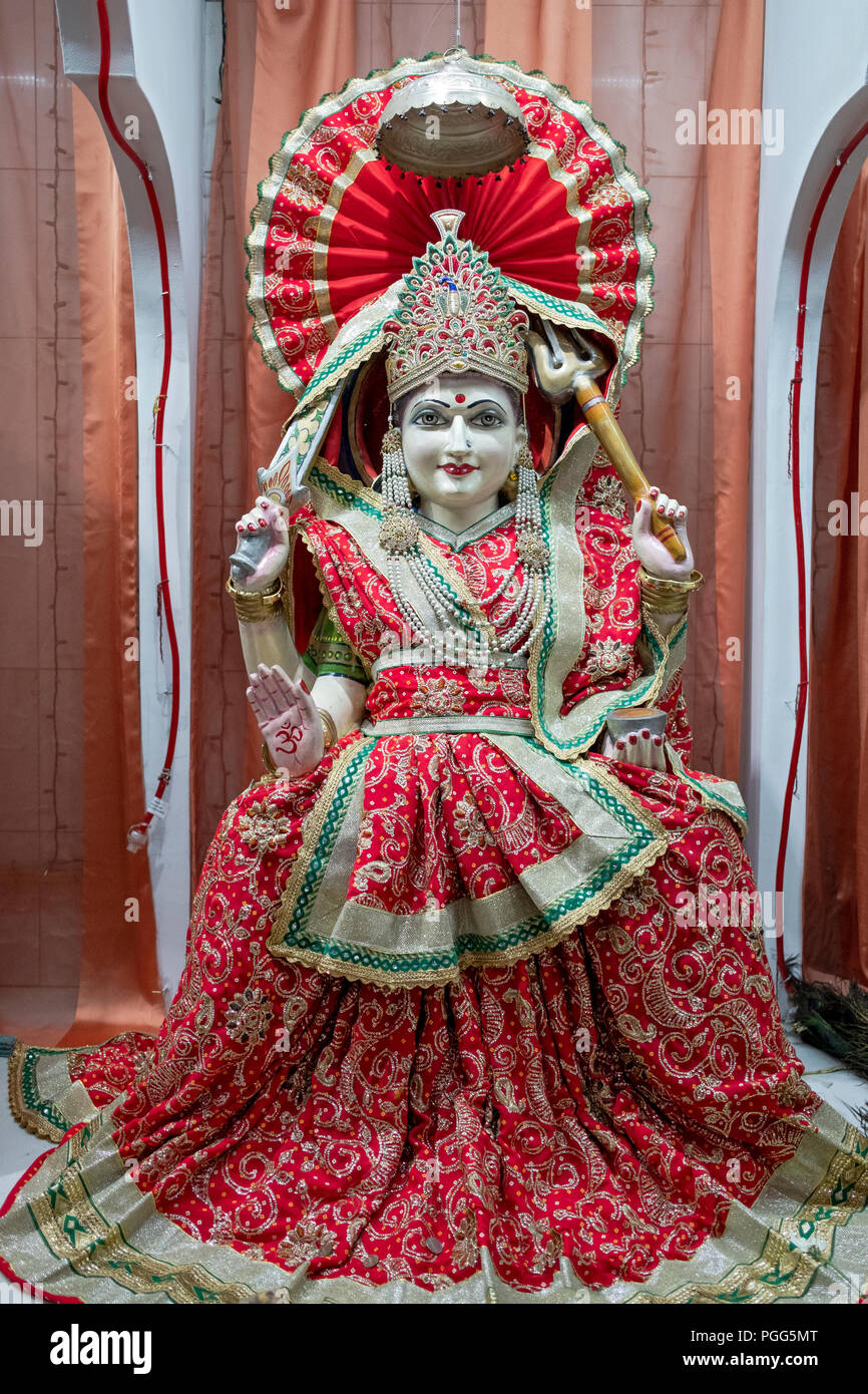 Une statue de Santoshi Mata, une déesse hindoue. Au Satya Narayan Mandir temple hindou à Elmhurst, Queens, New York City Banque D'Images