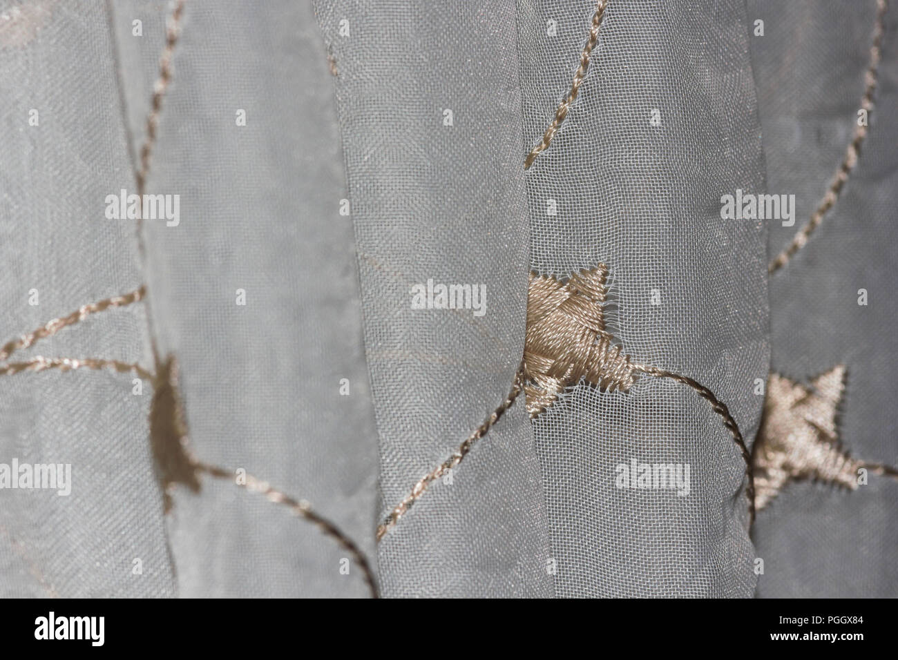 Étoile blanc et or Stores Rideaux Banque D'Images