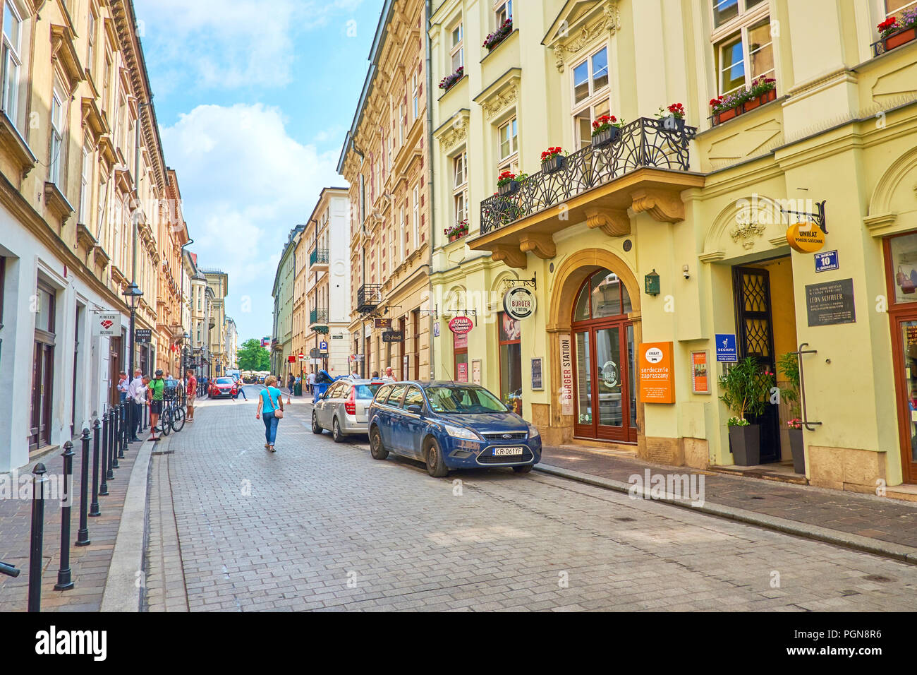 Cracovie, Pologne - 11 juin 2018 : Rue calme dans le centre de Cracovie avec de nombreux restaurants et cafés, le 11 juin à Cracovie. Banque D'Images