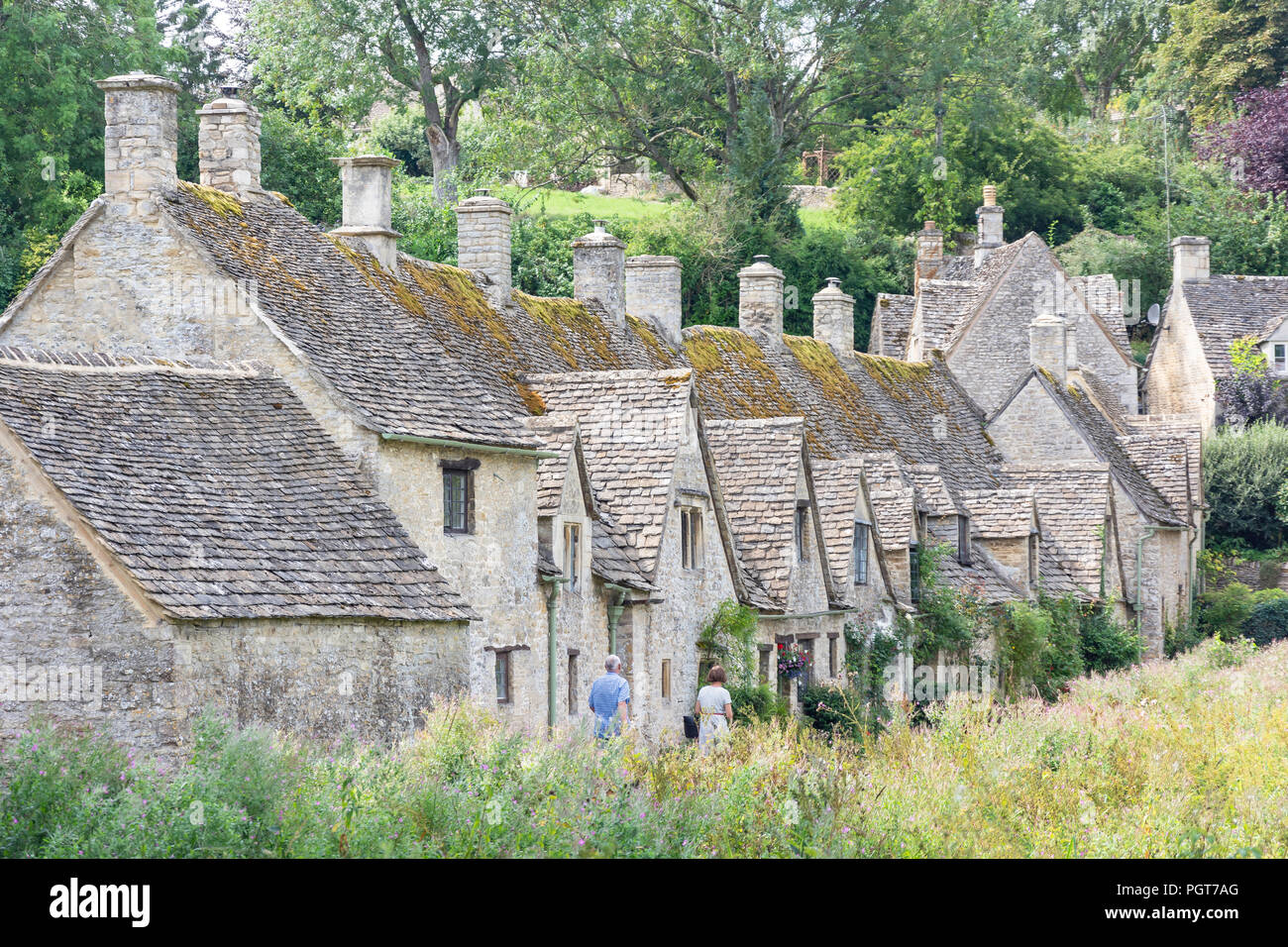 Cottages en pierre de Cotswold, Arlington Row, Bibury, Gloucestershire, Angleterre, Royaume-Uni Banque D'Images