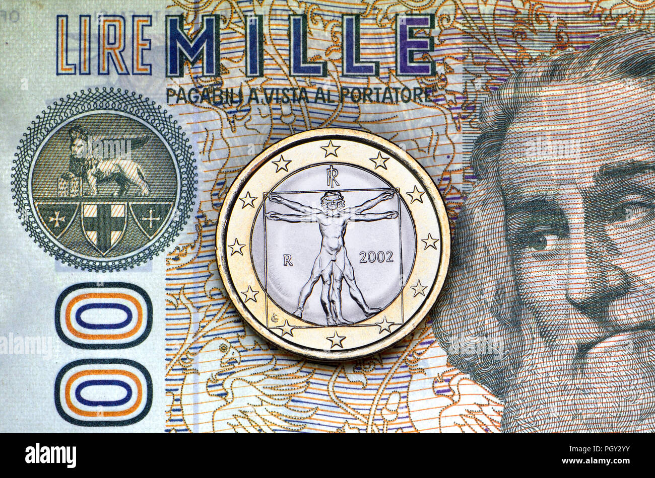 Pièce de 1 Euro italienne pré-Euro sur un billet de 100 lires avec droit de Marco Polo Banque D'Images