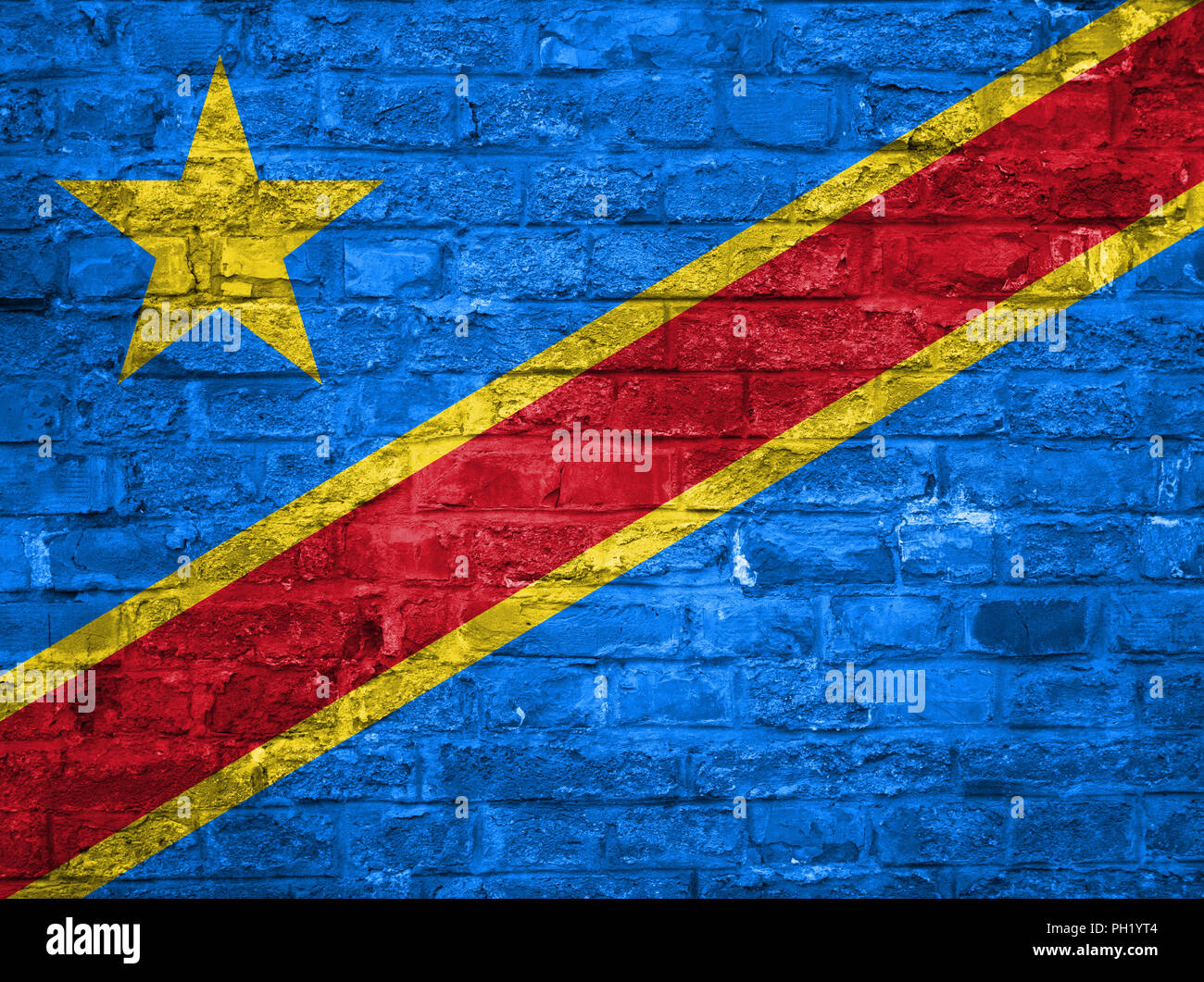 Drapeau de la République démocratique du Congo sur un vieux mur de briques historique, surface Banque D'Images