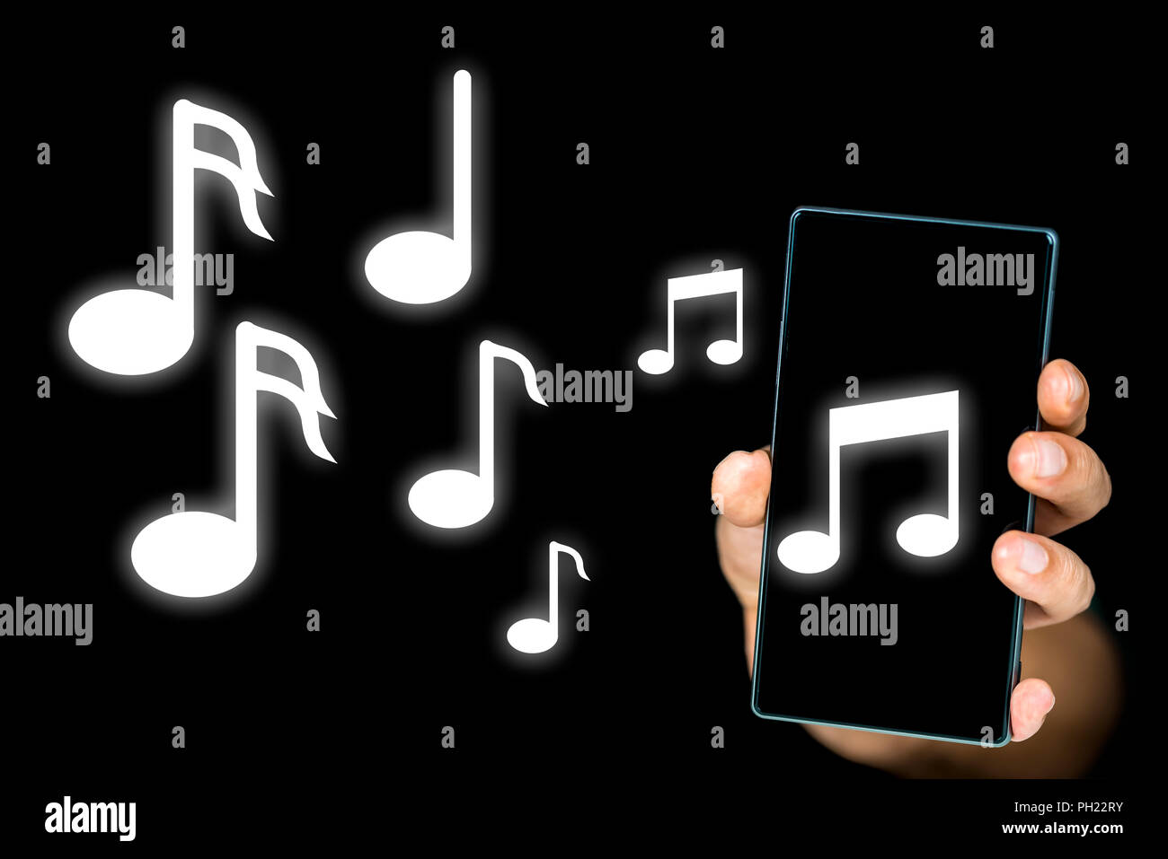 Image conceptuelle de l'émission de notes de musique à partir d'un lecteur  de musique mp3 ou des notes décrivant une alarme sonore encore de sonnerie  sur un téléphone mobile Photo Stock -
