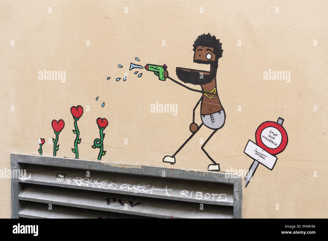Arrêter la violence par arme à feu - street art à Paris, France. Banque D'Images