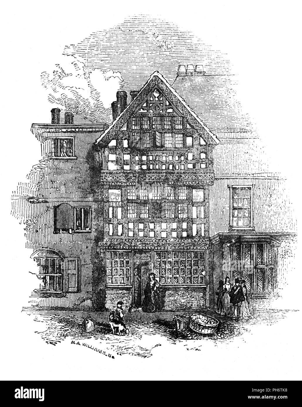 Une maison Tudor dans la High Street, Stratford-upon-Avon, Warwickshire, en Angleterre. Dans une typique maison Tudor le poids de la maison a été réalisée sur un châssis en bois. L'espace entre les poutres en bois a été complété soit avec la brique ou le plâtre. Pierre a été coûteuse pour plâtre a été utilisé comme le remplissage entre les poutres dans les petites maisons. Le plâtre a été blanchi à la chaux, donnant leurs maisons noir et blanc de l'apparence. Banque D'Images