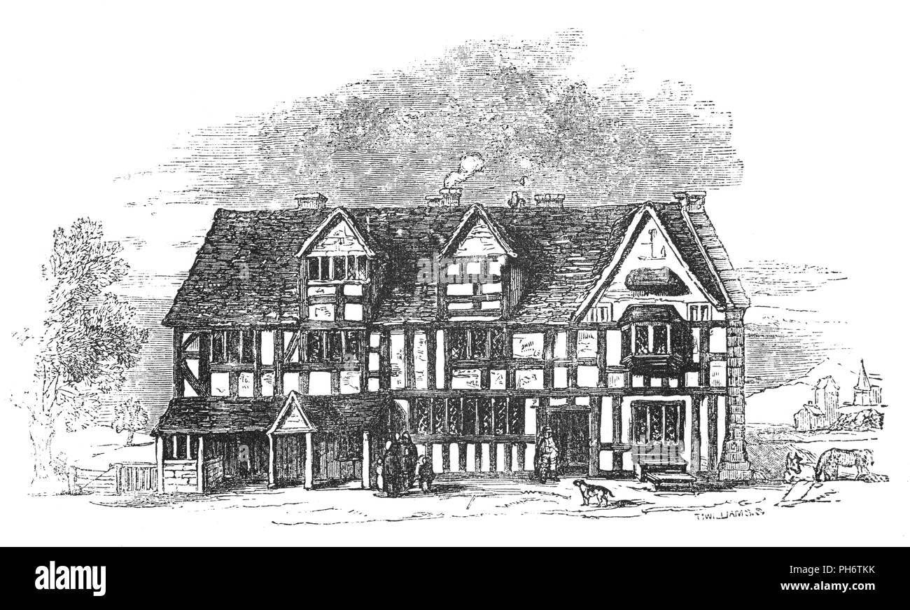 John Shakespeare Maison Tudor ont acheté en 1556 dans l'Henley Street, Stratford-upon-Avon, Warwickshire, en Angleterre, c'est la maison où William Shakespeare et ses frères et sœurs ont été élevés. Dans une typique maison Tudor le poids de la maison a été réalisée sur un châssis en bois. L'espace entre les poutres en bois a été complété soit avec la brique ou le plâtre. Pierre a été coûteuse pour plâtre a été utilisé comme le remplissage entre les poutres dans les petites maisons. Le plâtre a été blanchi à la chaux, donnant leurs maisons noir et blanc de l'apparence. Banque D'Images