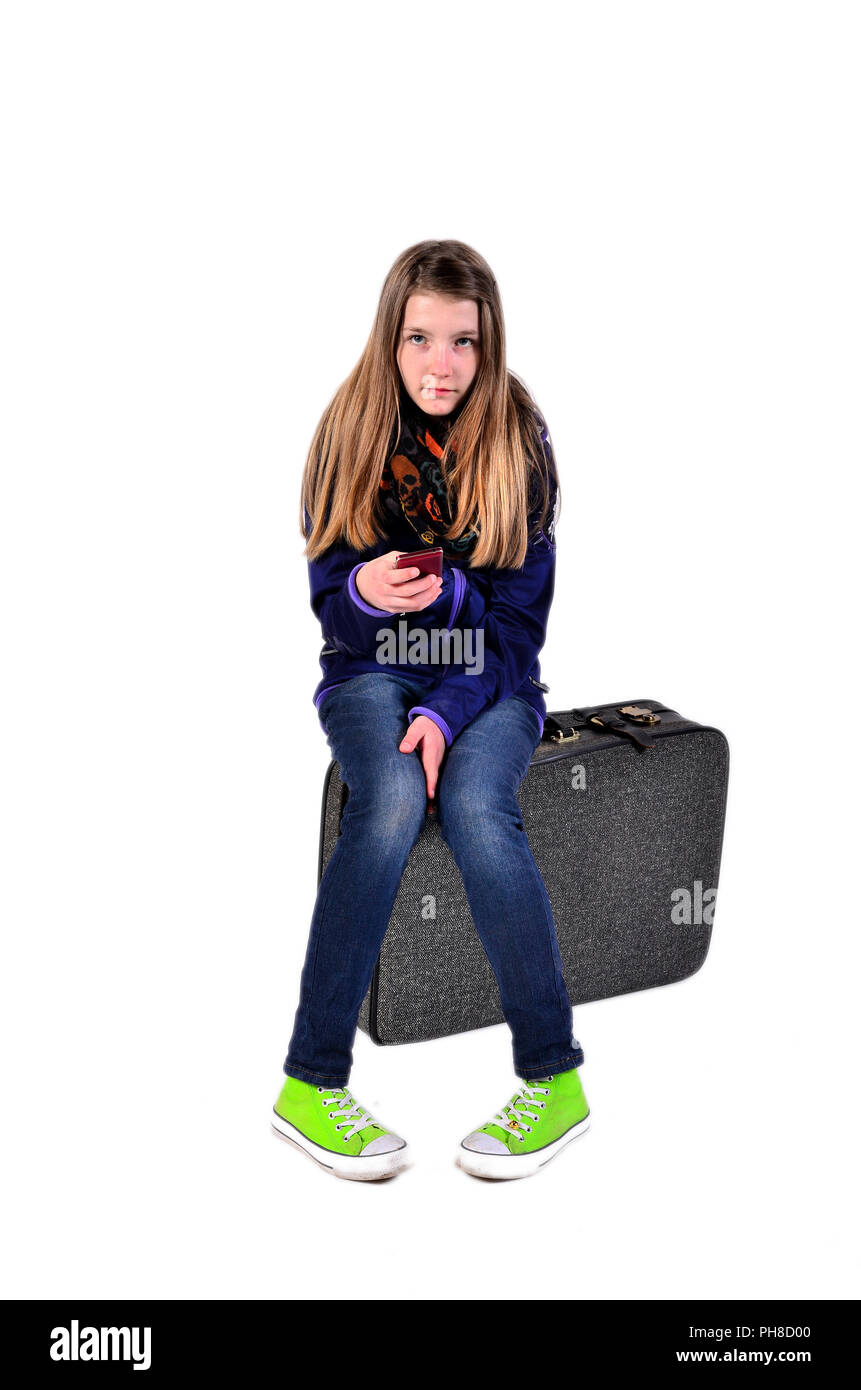 Cool fille avec une valise Banque D'Images