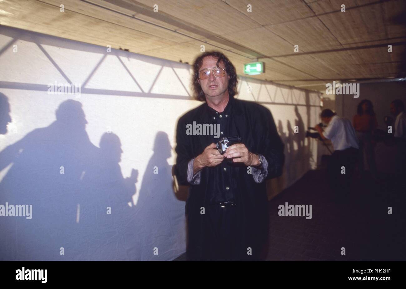 Andreas Walter Angerer, aka : Angerer der Jüngere, deutscher Kunstmaler Komponist umd, bei senneur Performance 'Abendmahl' à München, Deutschland 1992. Banque D'Images