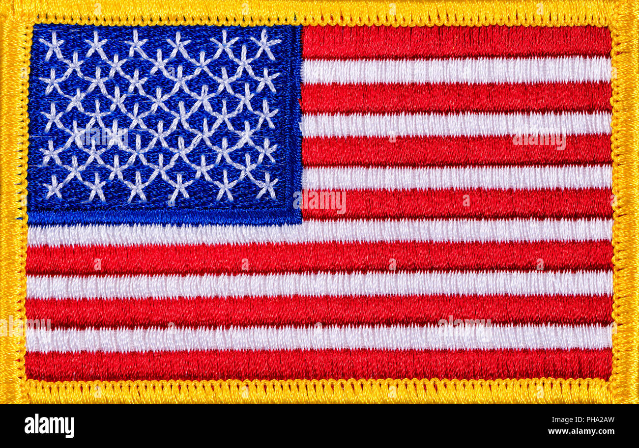 Gros plan d'une patch Drapeau USA avec garniture jaune Banque D'Images