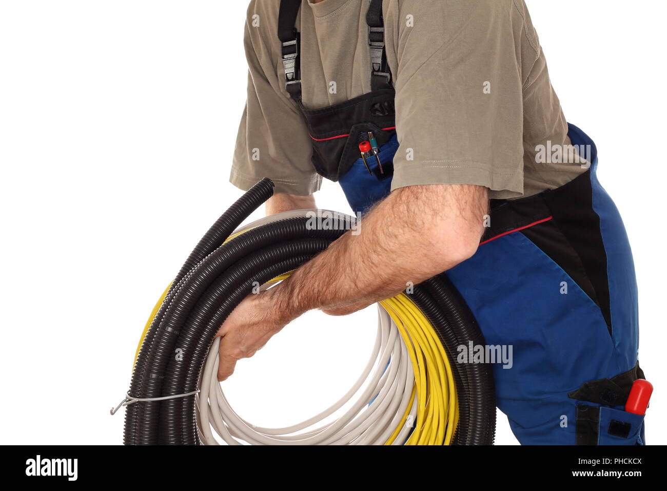 Électricien est transportant quelques chaînes du Banque D'Images