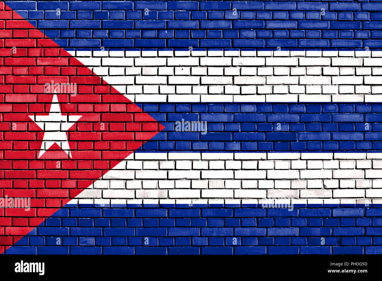 Drapeau de Cuba a peint sur mur de brique Banque D'Images