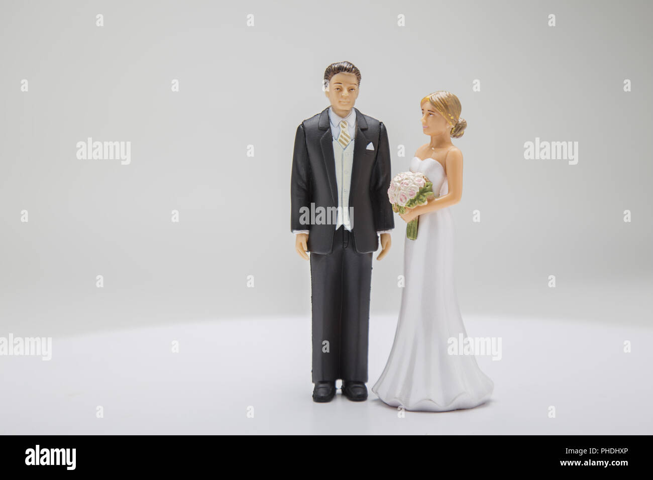 Man & woman wedding cake topper Banque D'Images