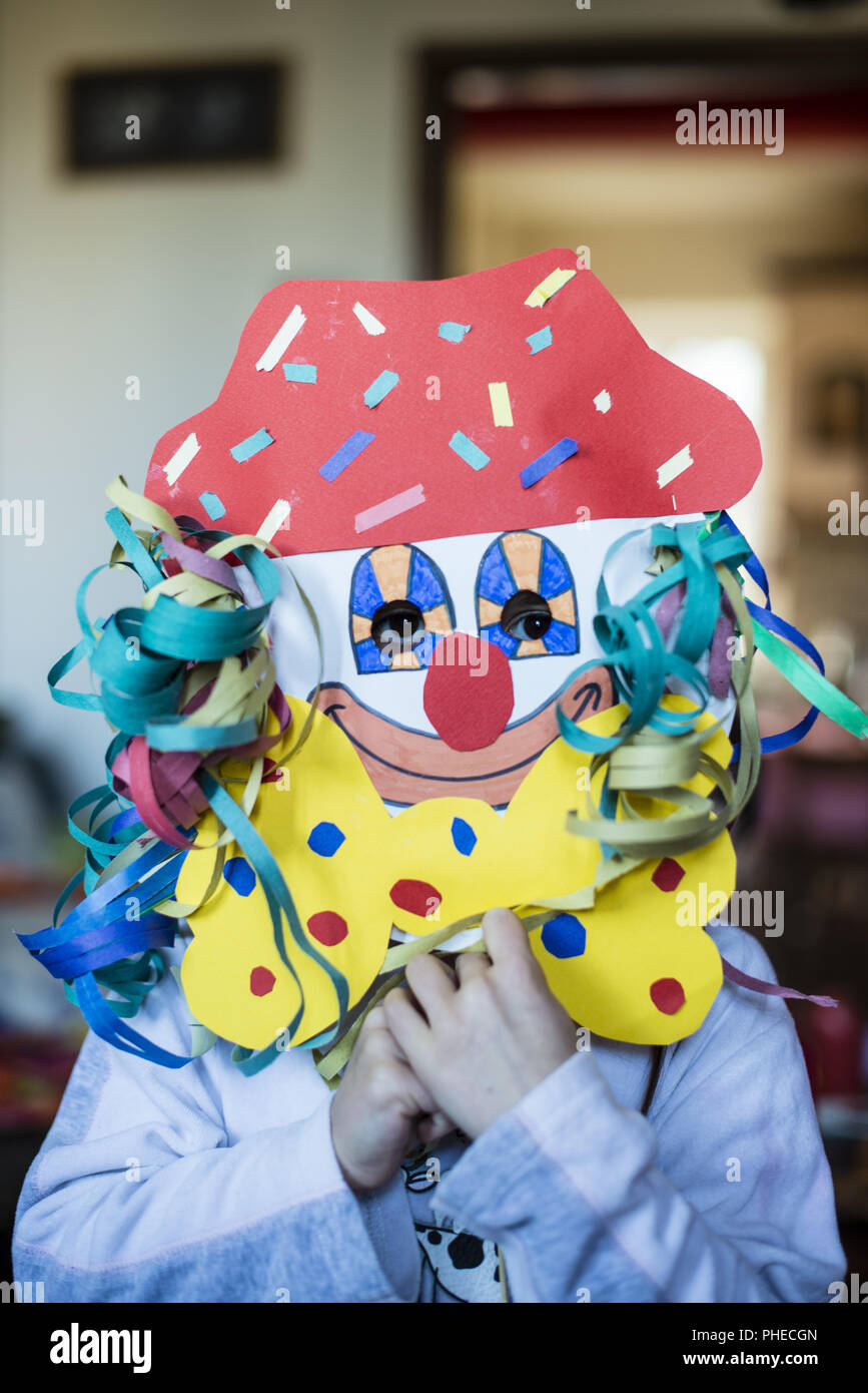 Portrait d'un enfant avec masque de carnaval Banque D'Images