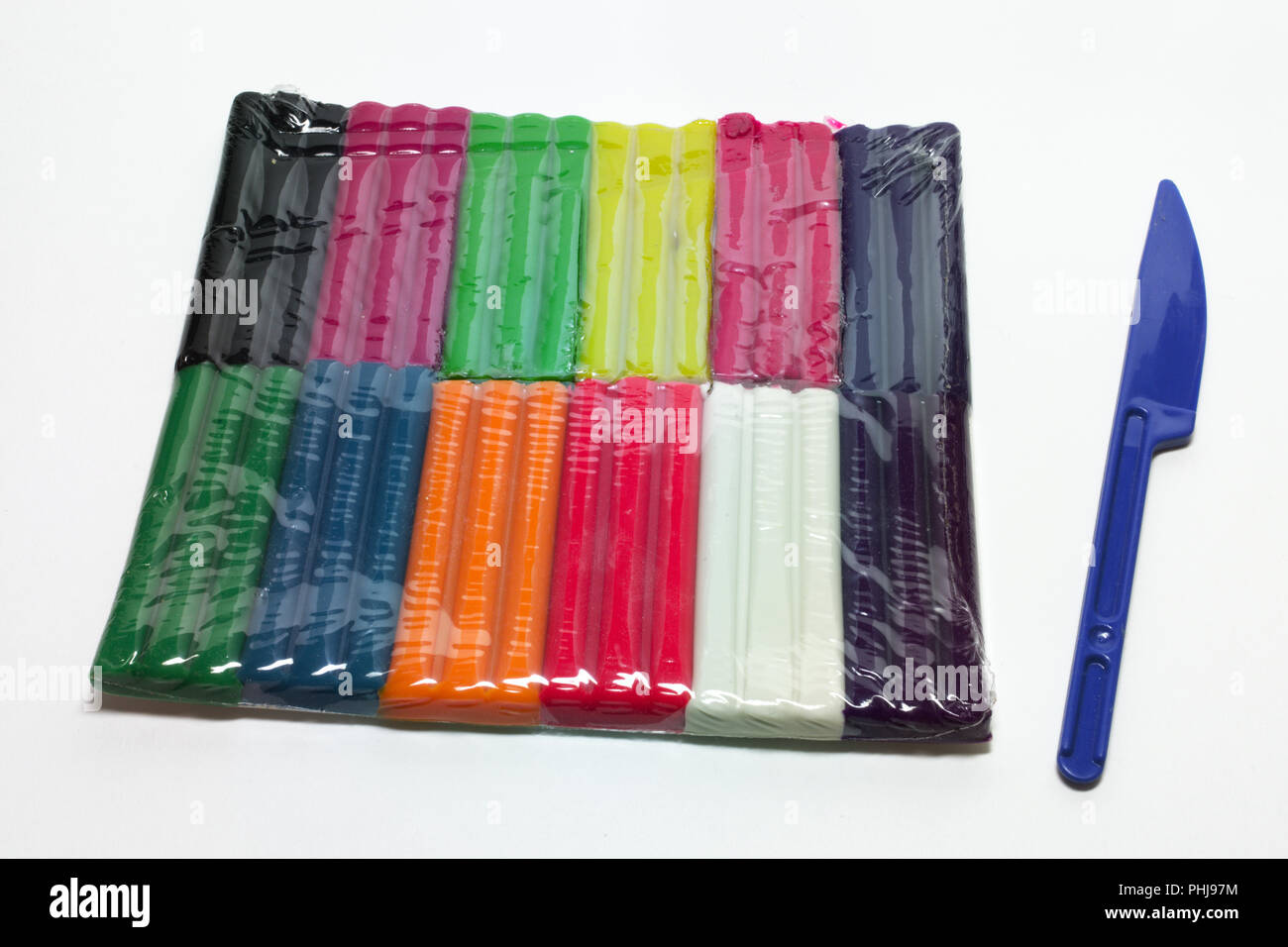 Entertainment Pack avec douze couleurs fluorescentes et de modélisation de la plasticine couteau Banque D'Images