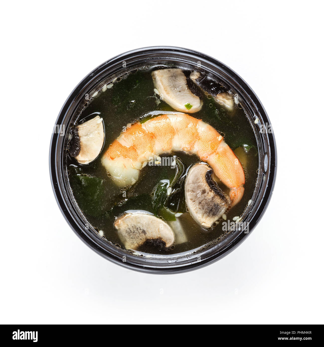 La soupe miso avec des fruits de mer sur fond blanc Banque D'Images