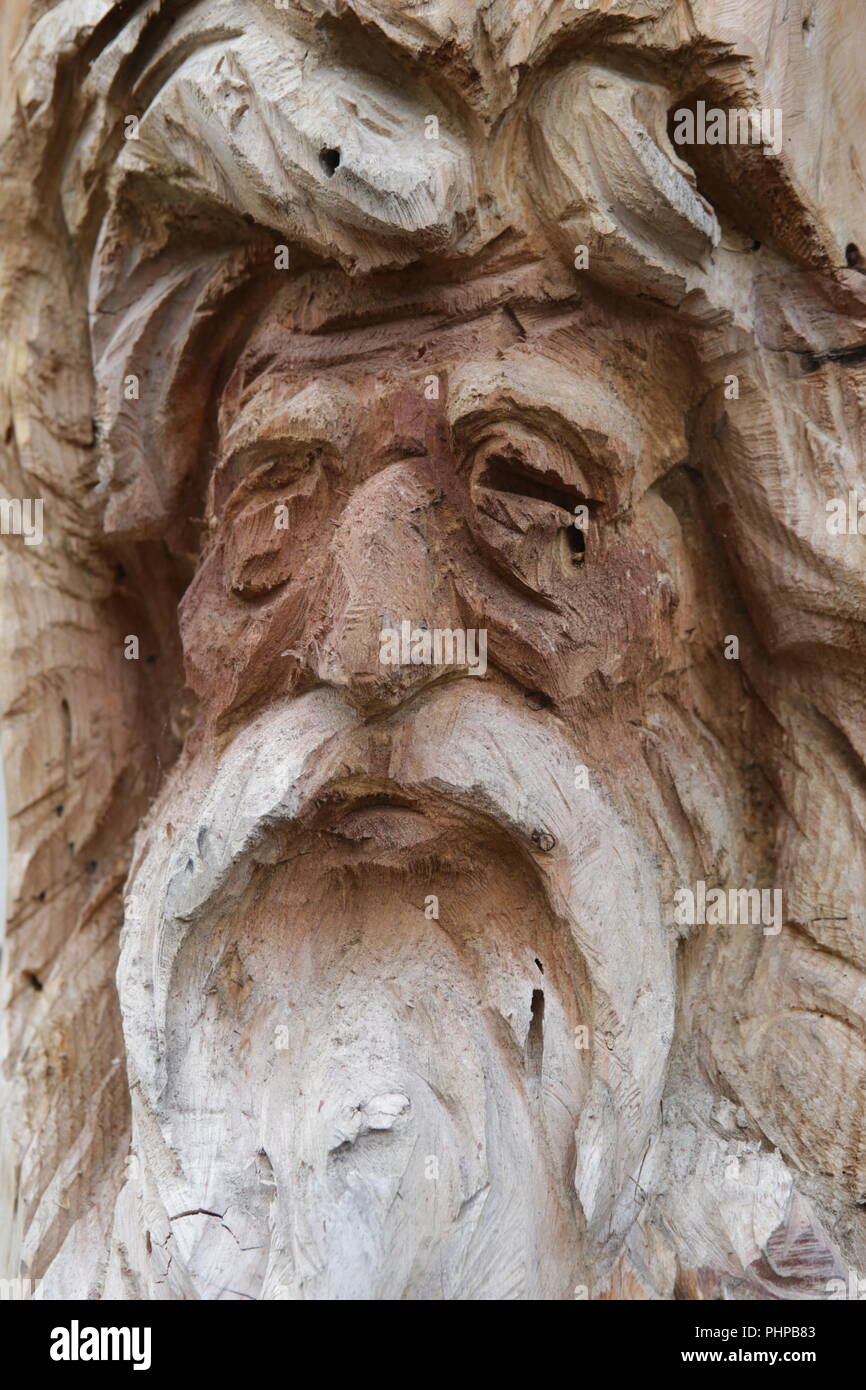 Face à l'homme de bois sculpté Banque D'Images