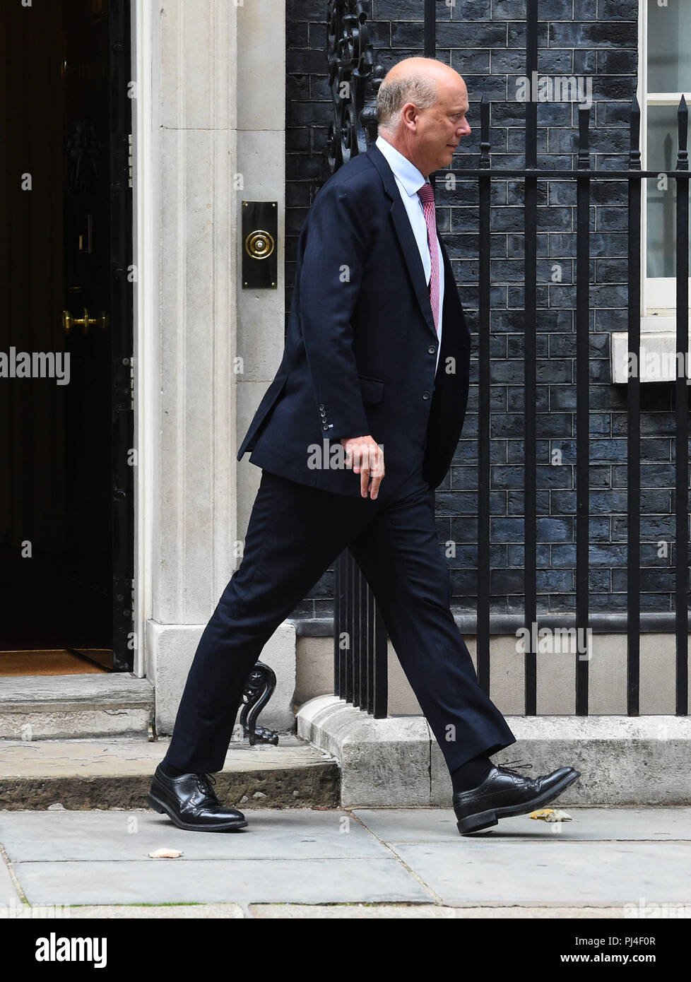 Secrétaire aux transports Chris Grayling en laissant 10 Downing Street, Londres après une réunion du Cabinet. Banque D'Images