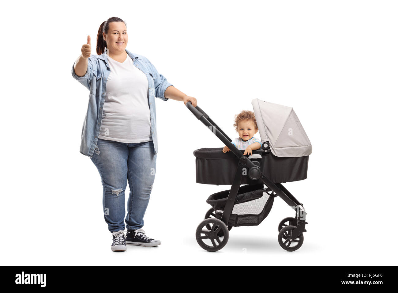 Portrait D Une Mere En Surpoids Avec Une Poussette Et Bebe Showing Thumbs Up Isole Sur Fond Blanc Photo Stock Alamy
