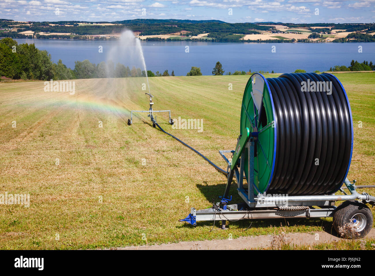 Irrigation par enrouleur de tuyau agricole Banque de photographies et  d'images à haute résolution - Alamy