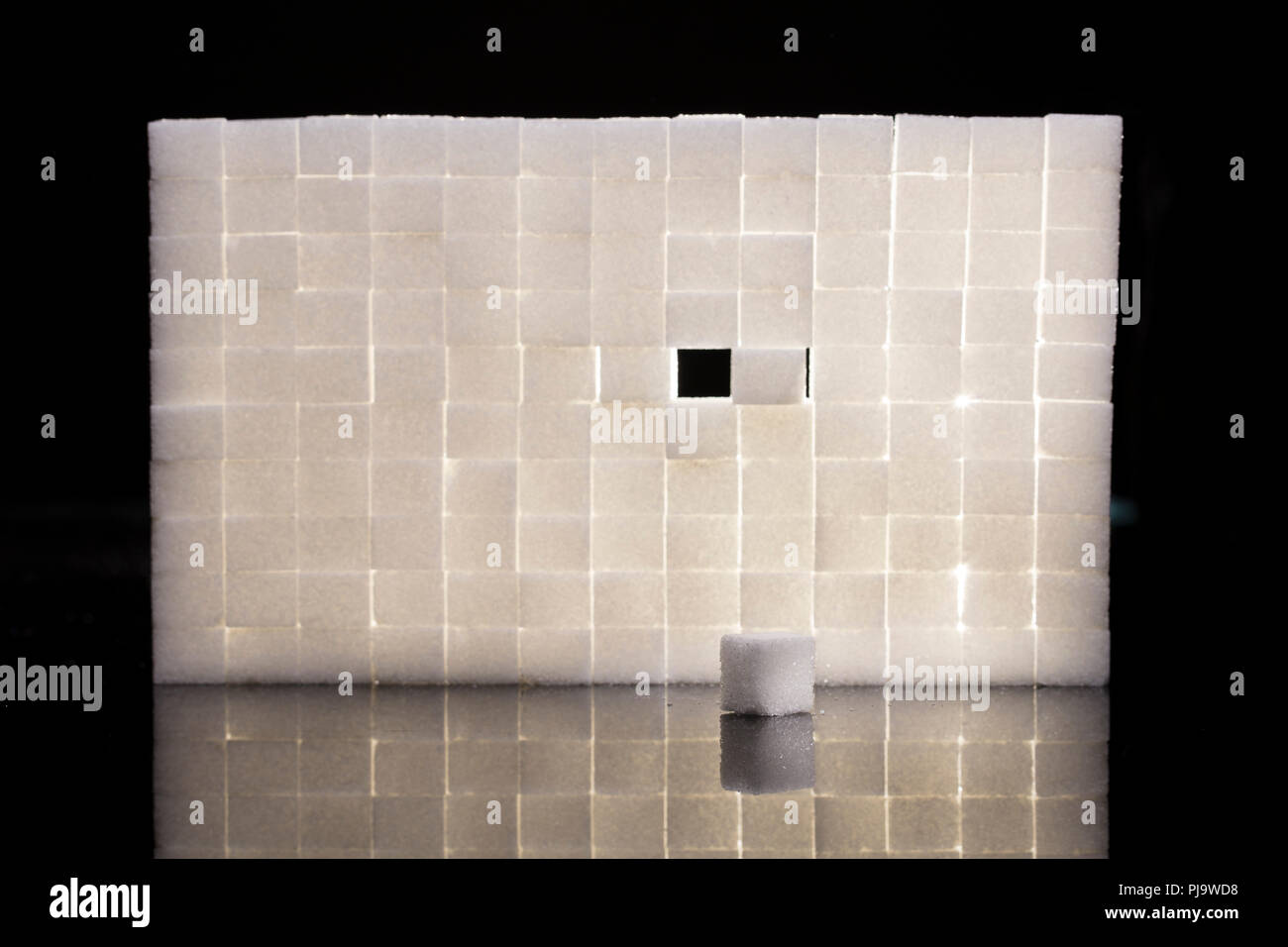 Sucre blanc, cubes ou en poudre Banque D'Images