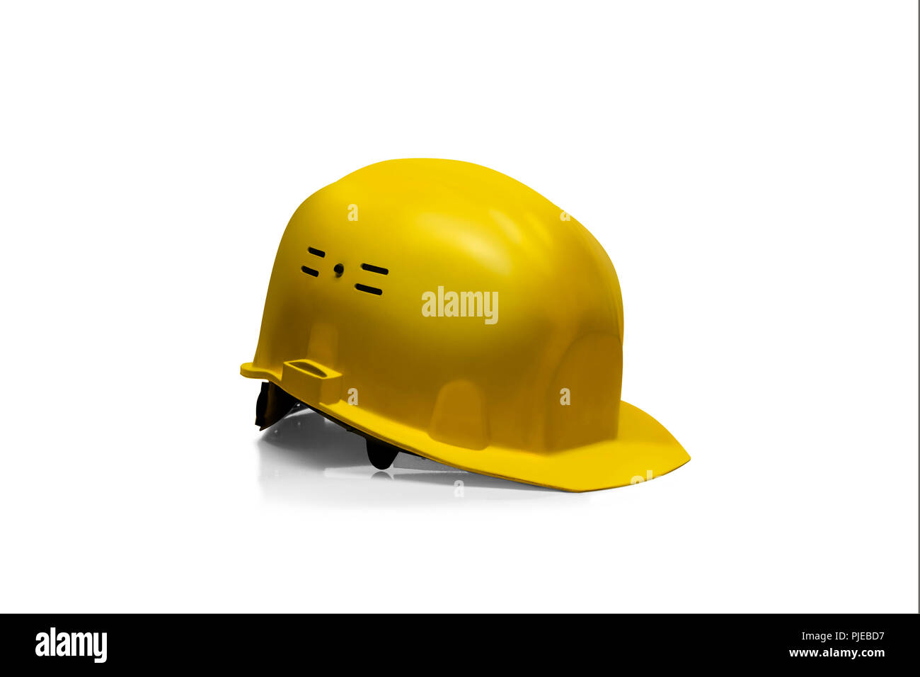 Casque de sécurité en plastique jaune isolé sur fond blanc Banque D'Images