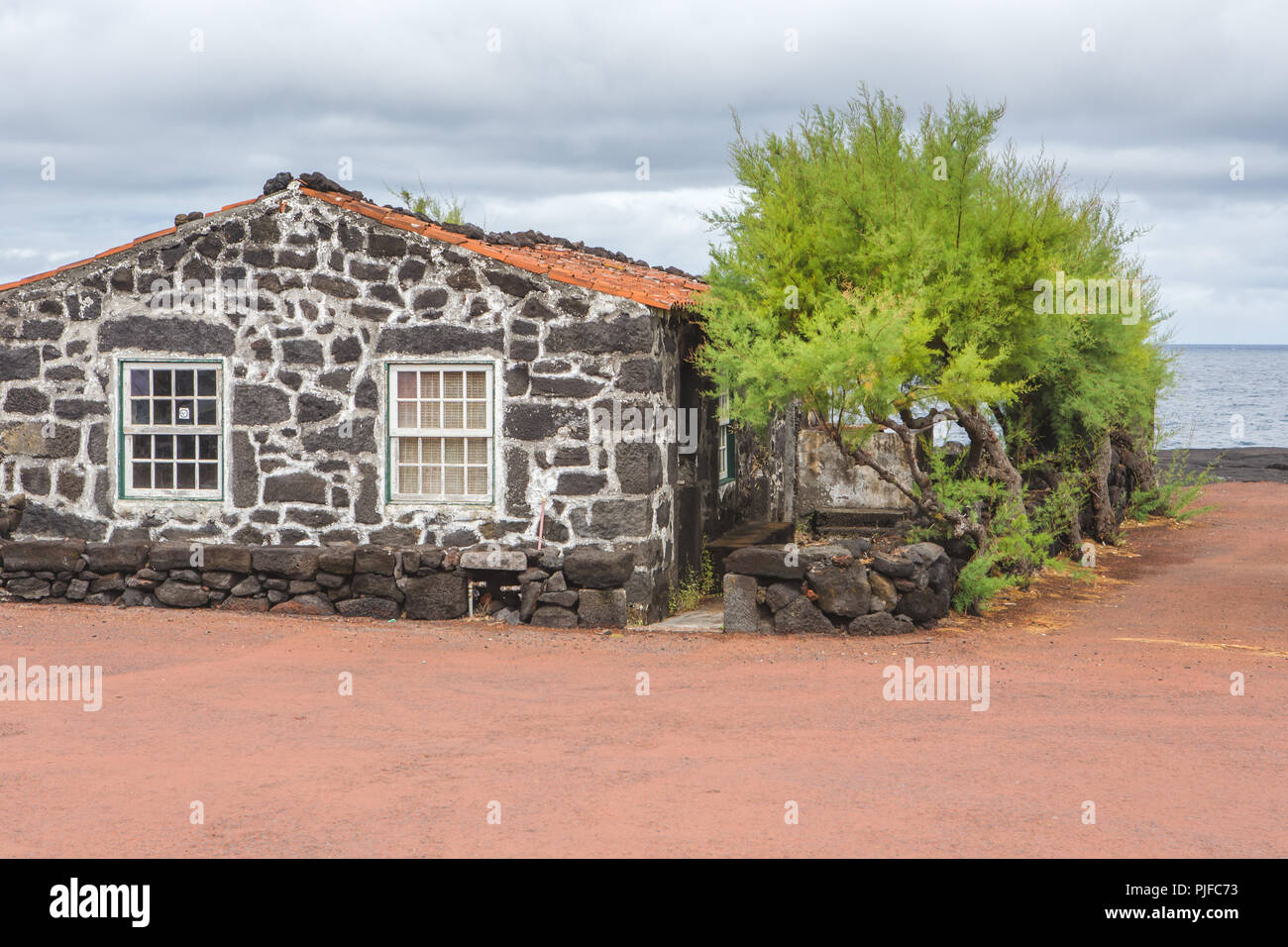 Maison typique faite de roches volcaniques, Verdelho, région viticole de l'île de Pico, Açores, Portugal Banque D'Images