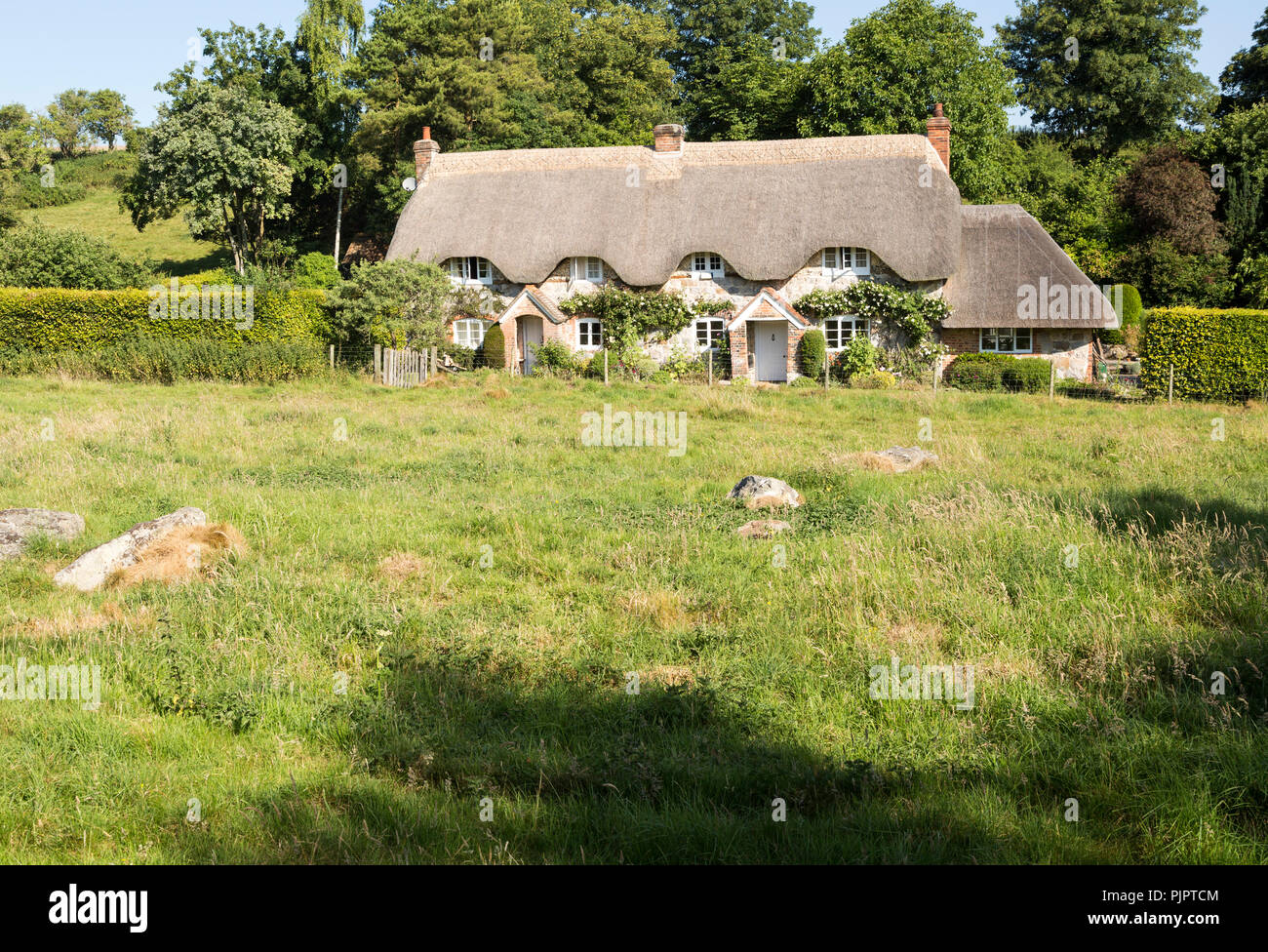 Chaumières attrayant historique, Lockeridge déné, près de Marlborough, Wiltshire, England, UK Banque D'Images