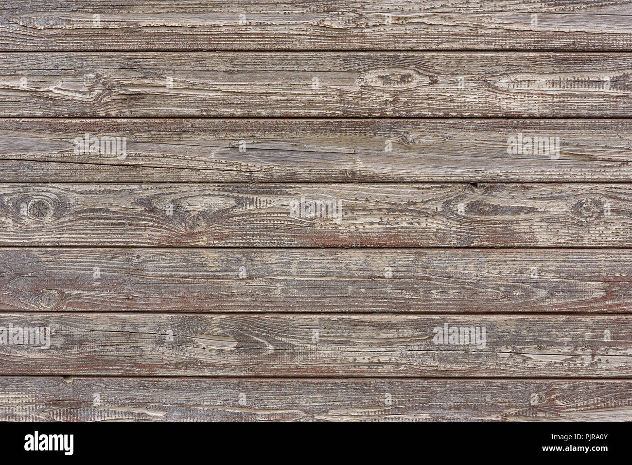 Ensemble de planches de bois vieux gris en arrière-plan Banque D'Images
