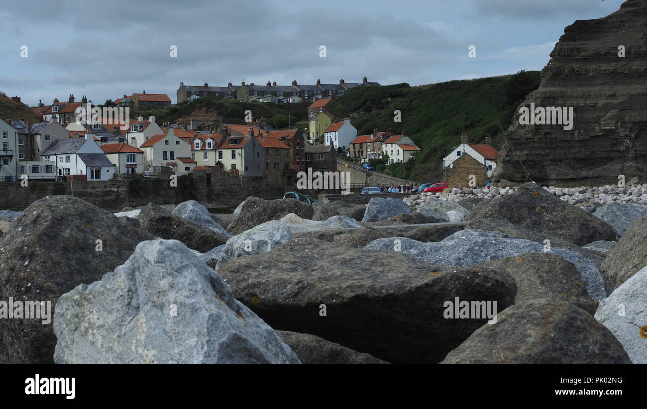 Whitby, Stathes et Robin Hood's Bay, sur la côte est, dans le Yorkshire du Nord des marines et des paysages pendant le lever du soleil. Banque D'Images