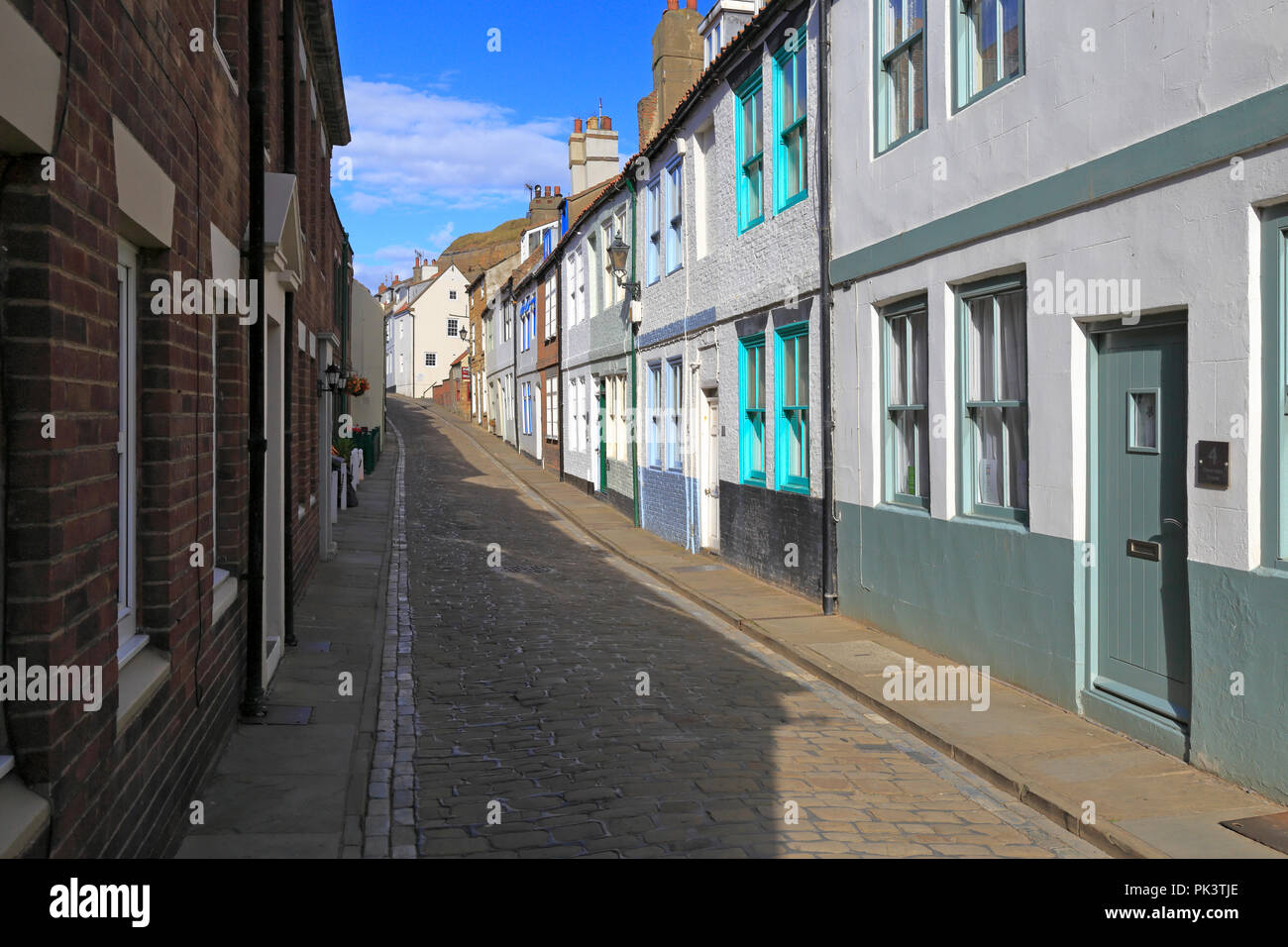 Maison de vacances Chalets sur Henrietta Street pavées, Whitby, North Yorkshire, Angleterre, Royaume-Uni. Banque D'Images