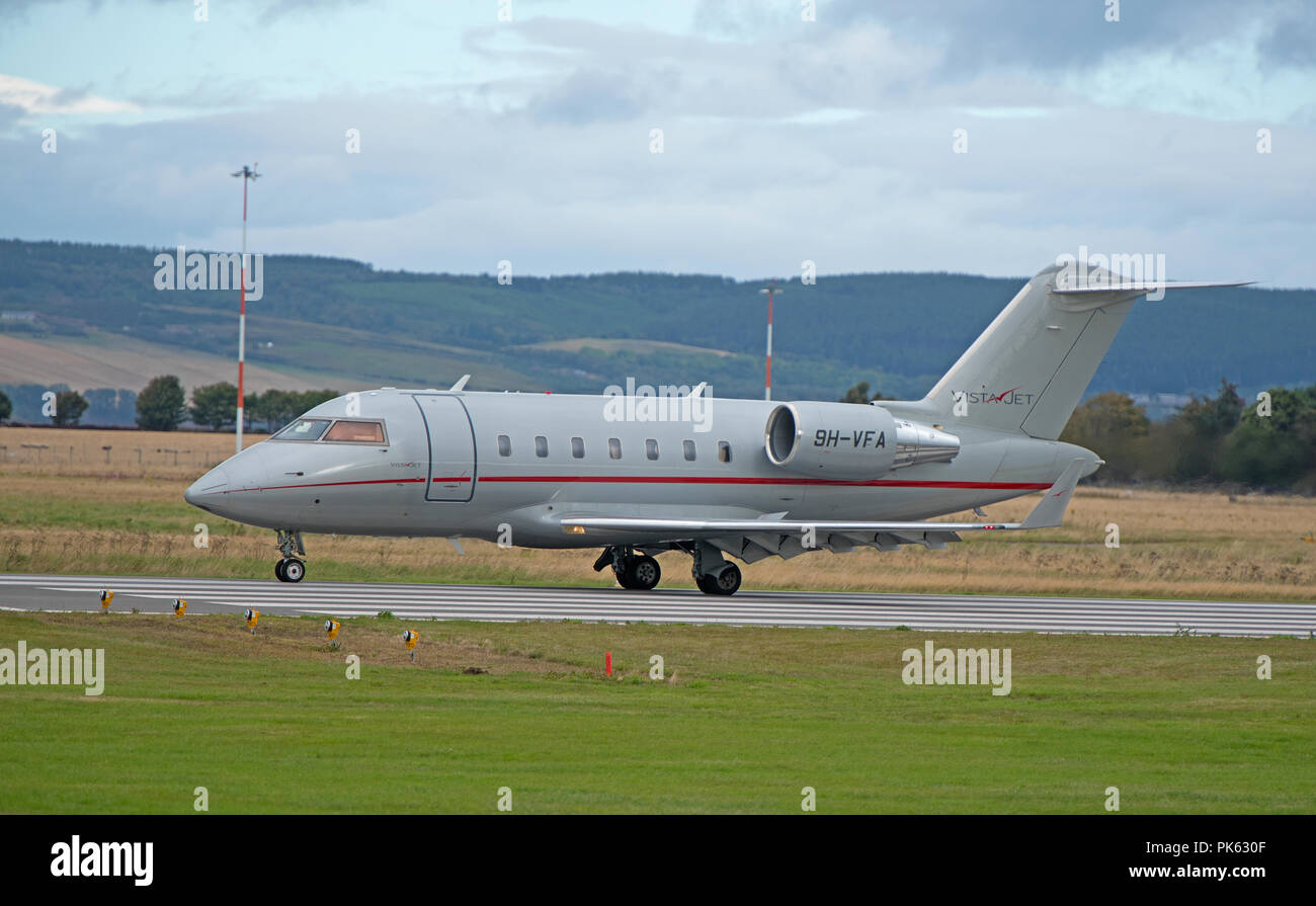 La maltaise Canadair Challenger 605 Vistajet 9H-VFA arrivant à l'aéroport de Inverness Dalcross. Banque D'Images