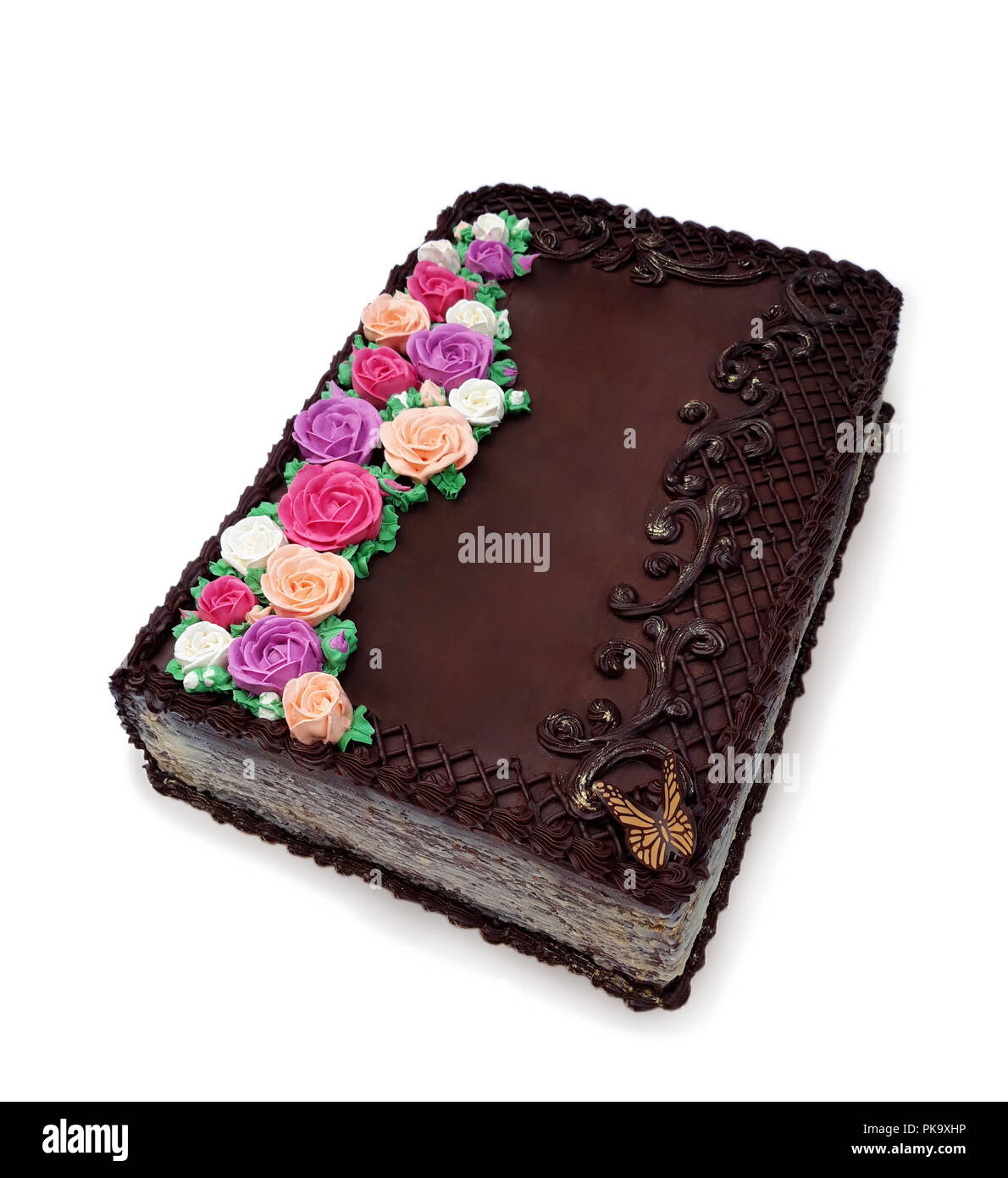 Un Grand Gateau Au Chocolat En Forme De Livre Avec Des Fleurs Colorees A Partir De Creme Photo Stock Alamy