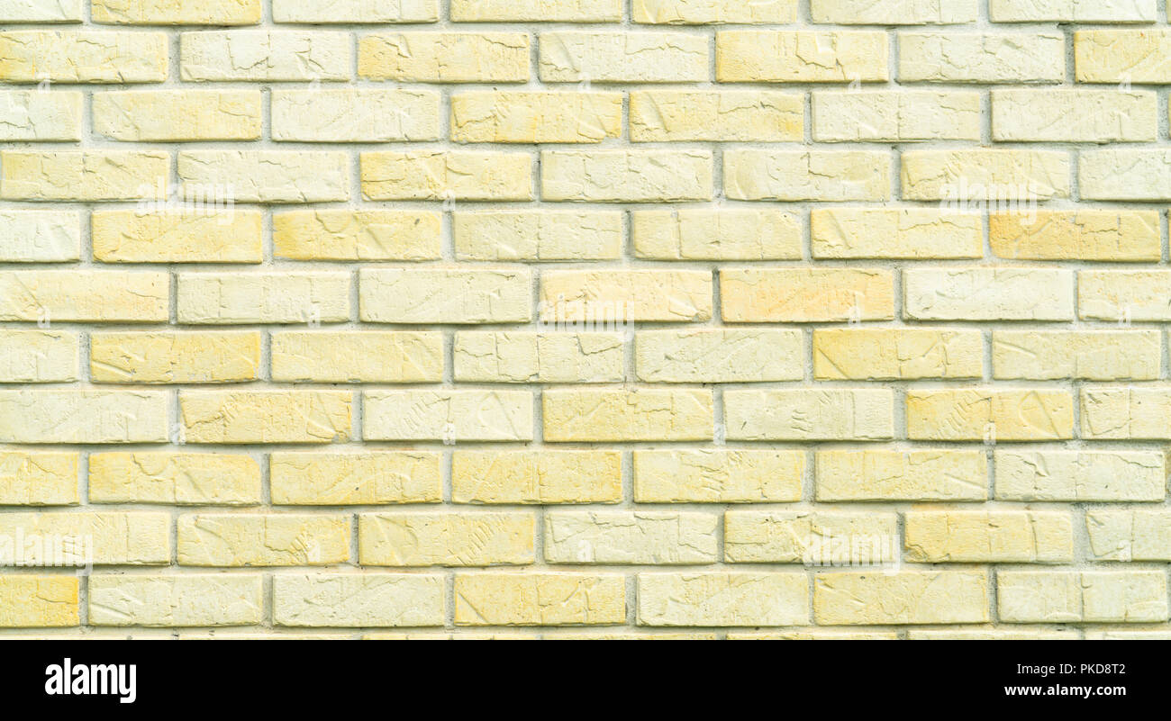 Mur de brique jaune et blanc texture background avec l'espace pour le texte. Fond d'anciennes briques. Accueil décoration intérieure. Concept de l'architecture Banque D'Images