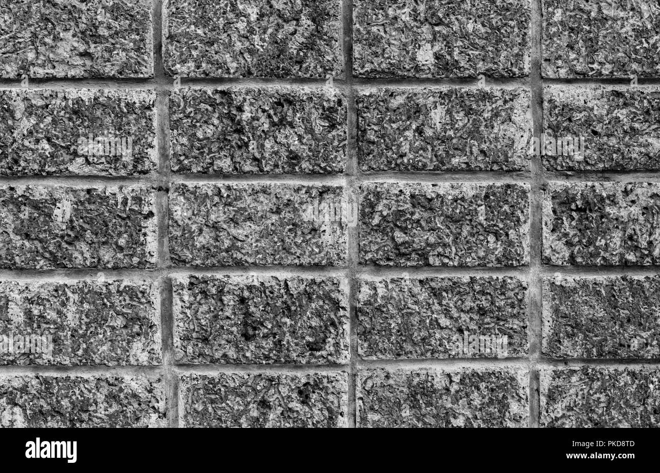 Mur de béton foncé texture background avec l'espace pour le texte. Briques en noir et blanc papier peint. Accueil décoration intérieure. Concept de l'architecture. Sans espoir, Banque D'Images