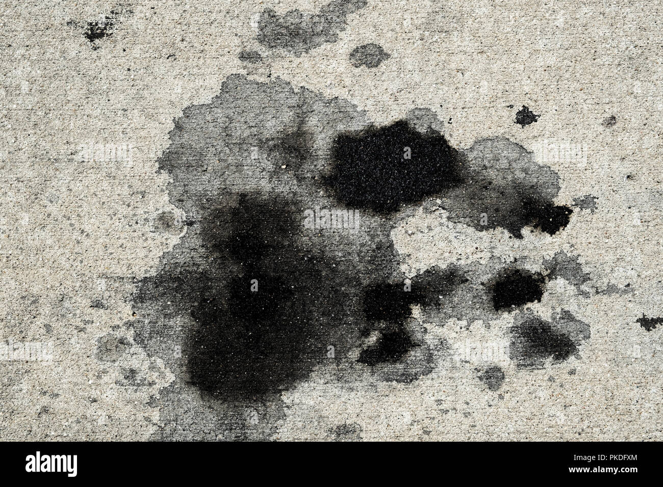 Les taches d'huile moteur sur le revêtement en béton/texture background  Photo Stock - Alamy