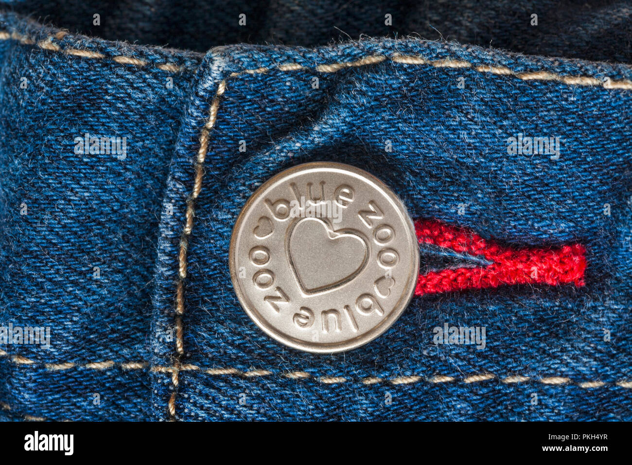 Zoo bleu jeans sur le bouton Banque D'Images