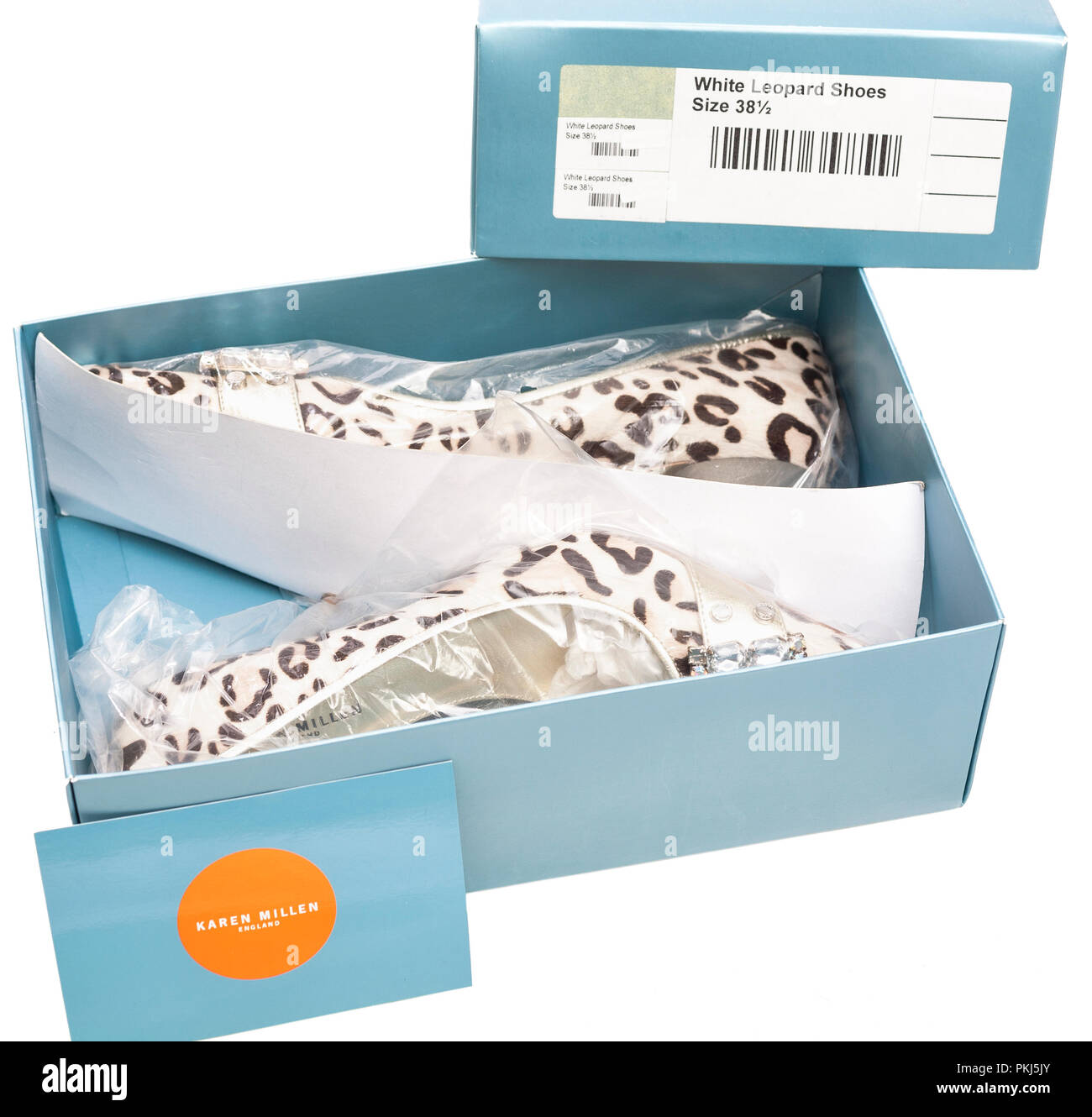 Brand new Karen Millen luxury leopard print High heels shoes encore en emballage plastique dans la boîte à chaussures isolé sur fond blanc Banque D'Images