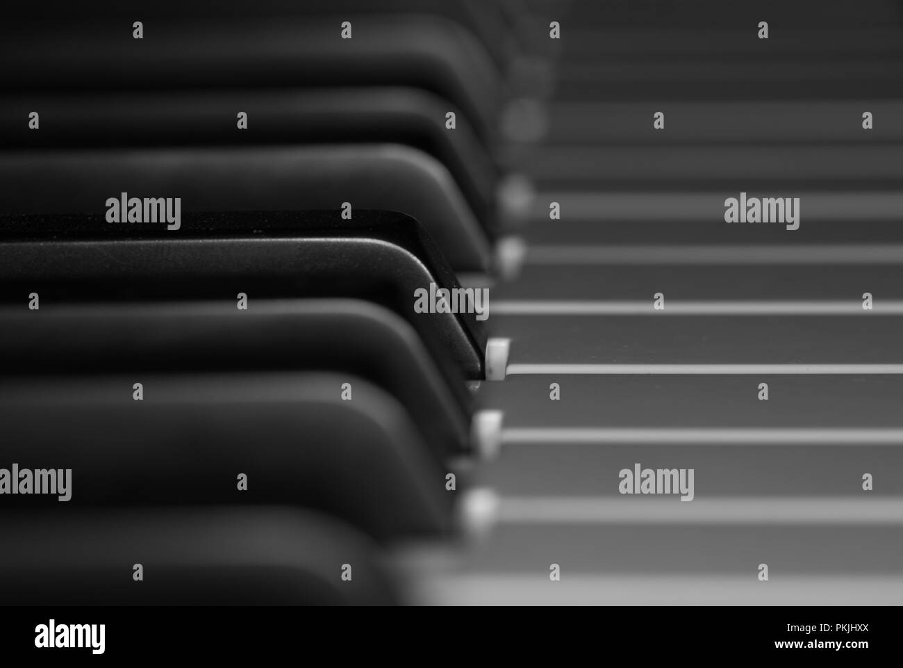 Close-up grand touches piano noir et blanc Banque D'Images