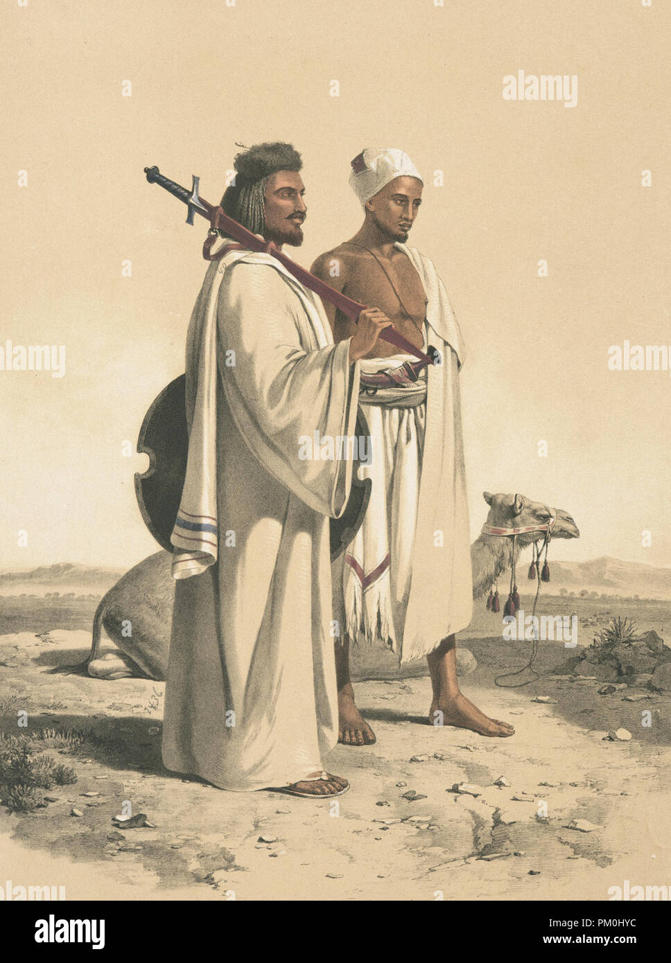 Les Arabes et les chameaux dans le désert Banque D'Images