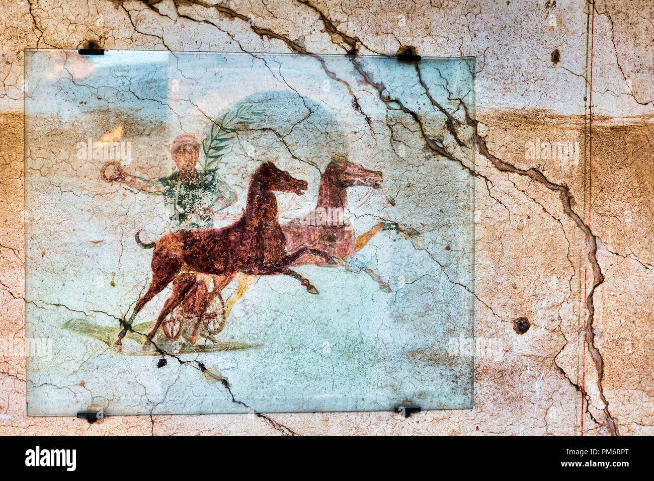 Fresco avec l'Aurighi dans un couloir de l'immeuble Aurighi dans les fouilles archéologiques de l'Ancienne Ostia - Rome Banque D'Images